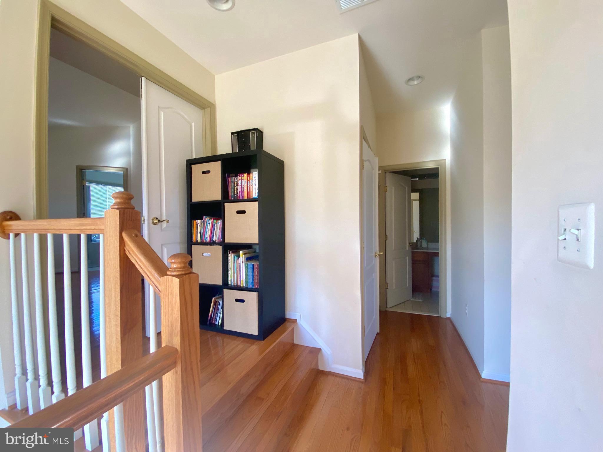 21975 Windover Drive Broadlands, VA 20148 - Photo 14 of 37 a view of a hallway with wooden floor and entryway