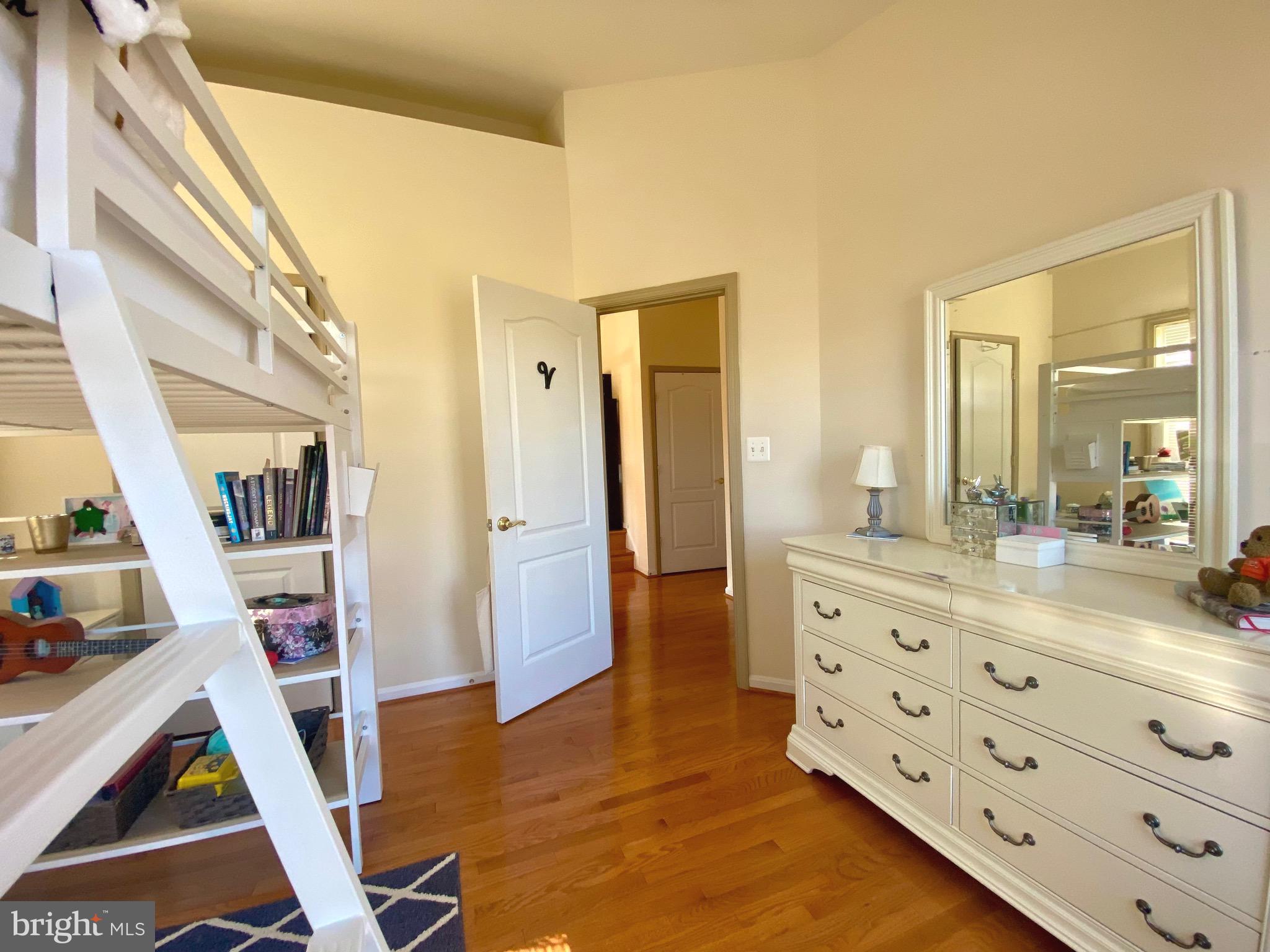 21975 Windover Drive Broadlands, VA 20148 - Photo 17 of 37 a living room with furniture and a wooden floor