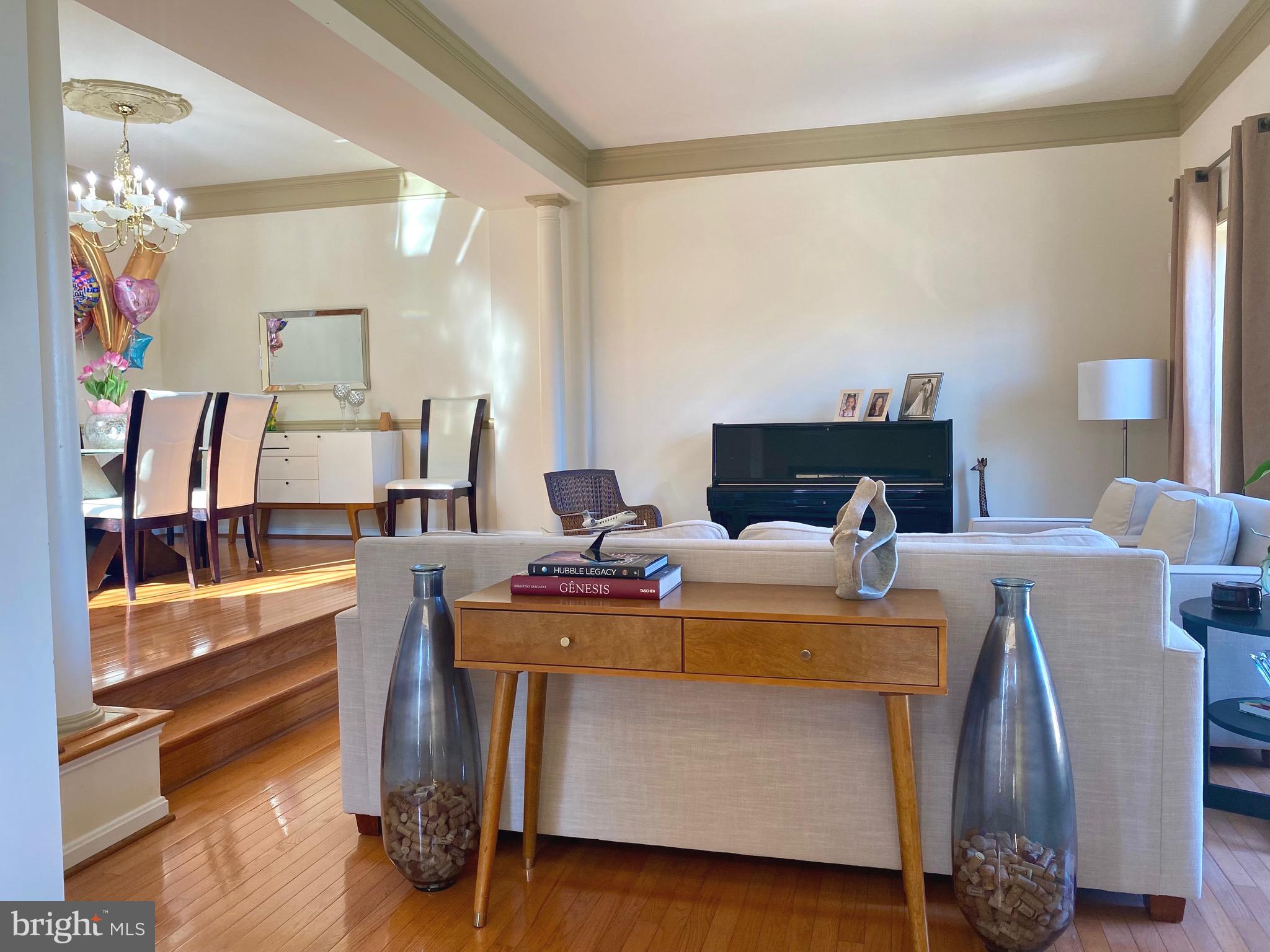 21975 Windover Drive Broadlands, VA 20148 - Photo 2 of 37 a view of living room with furniture and wooden floor