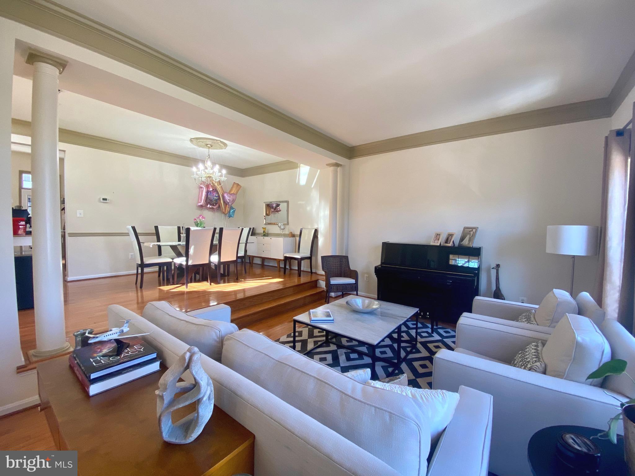 21975 Windover Drive Broadlands, VA 20148 - Photo 3 of 37 a living room with furniture and a table