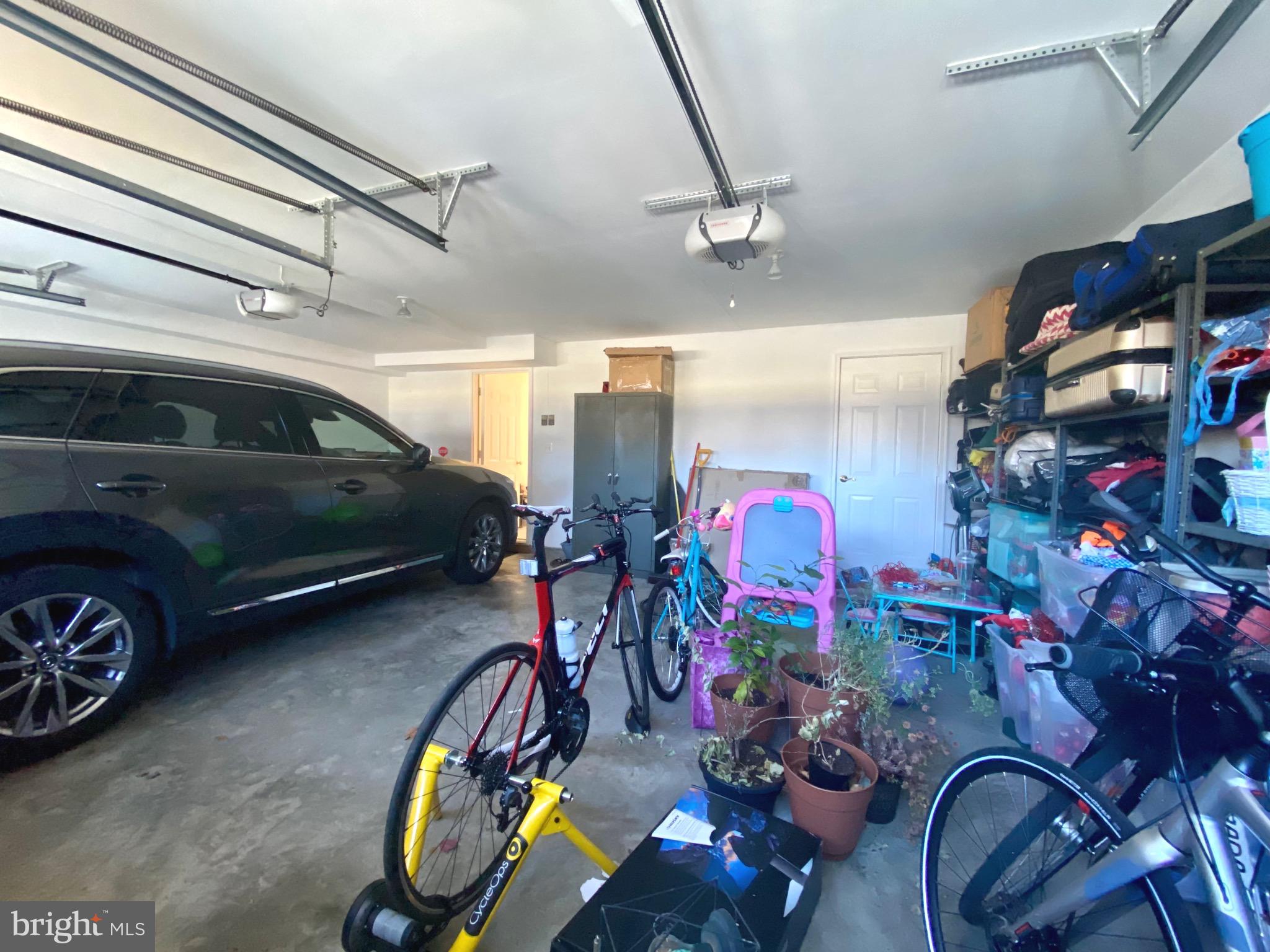 21975 Windover Drive Broadlands, VA 20148 - Photo 34 of 37 a view of parking garage with cars