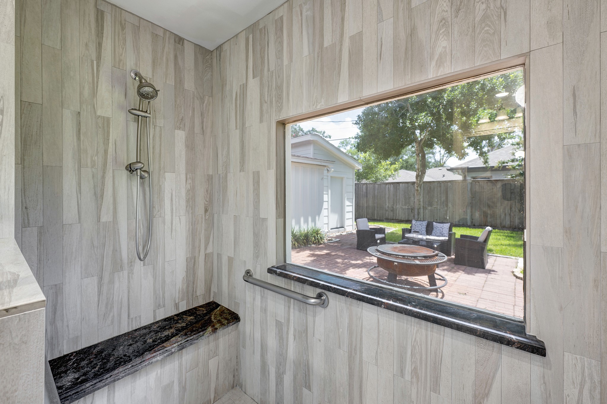 1324 Bingle Road Spring Valley Village, TX 77055 - Photo 14 of 22 a kitchen with a large window in it and outdoor space
