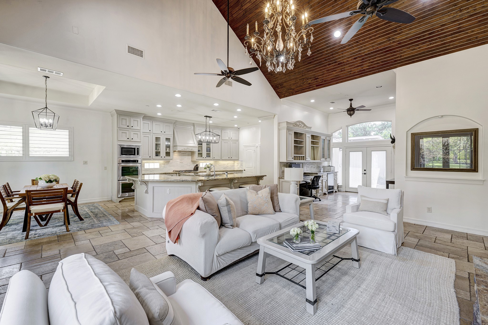 1324 Bingle Road Spring Valley Village, TX 77055 - Photo 2 of 22 a living room with furniture kitchen view and a chandelier