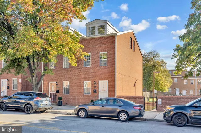 a car parked in front of a house