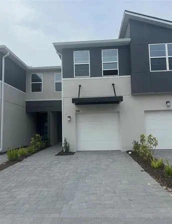 a house view with a outdoor space