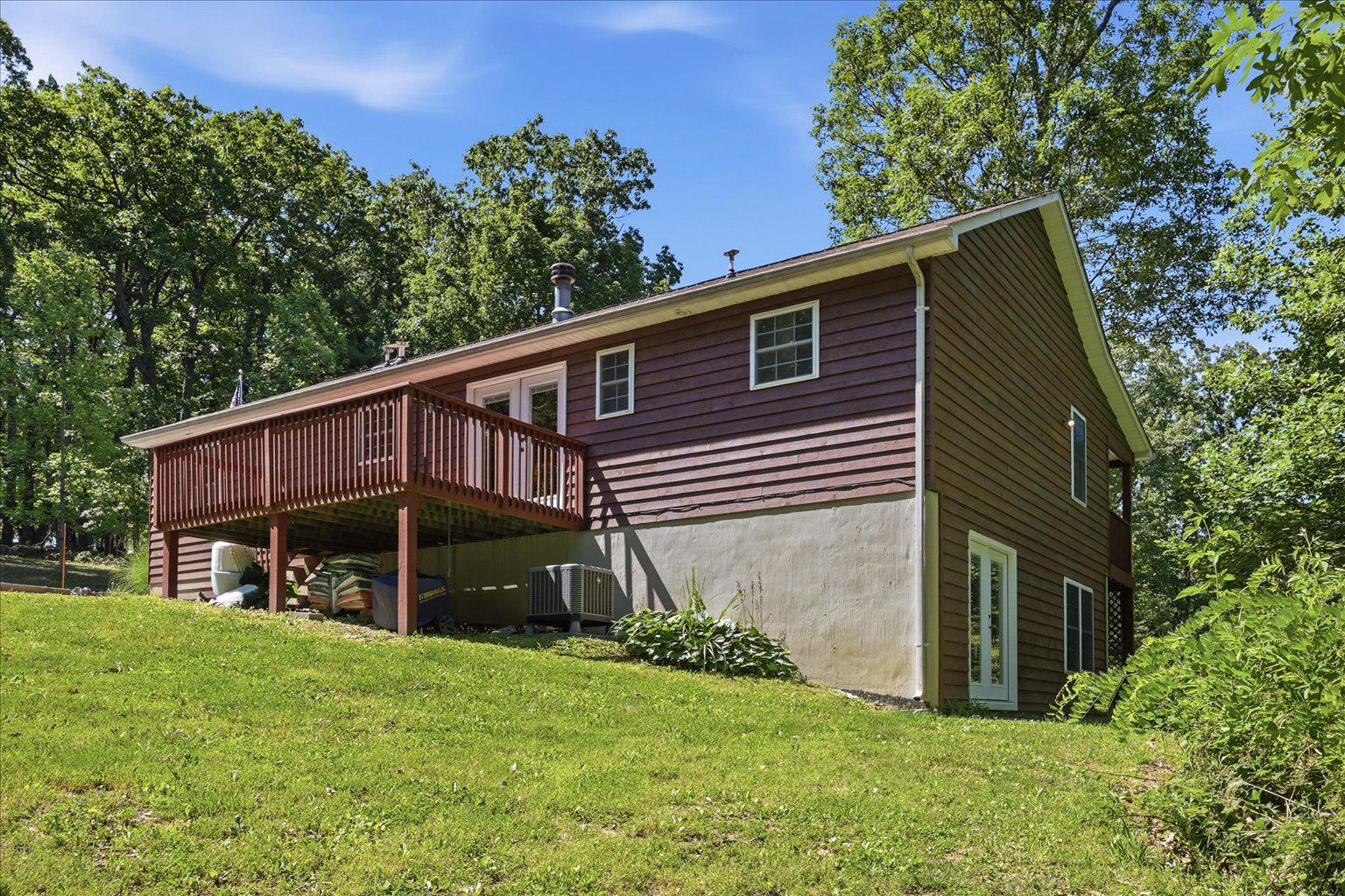 323 South Timber Ridge Road Cross Junction, VA 22625 - Photo 53 of 109 Rear and side basement entrance