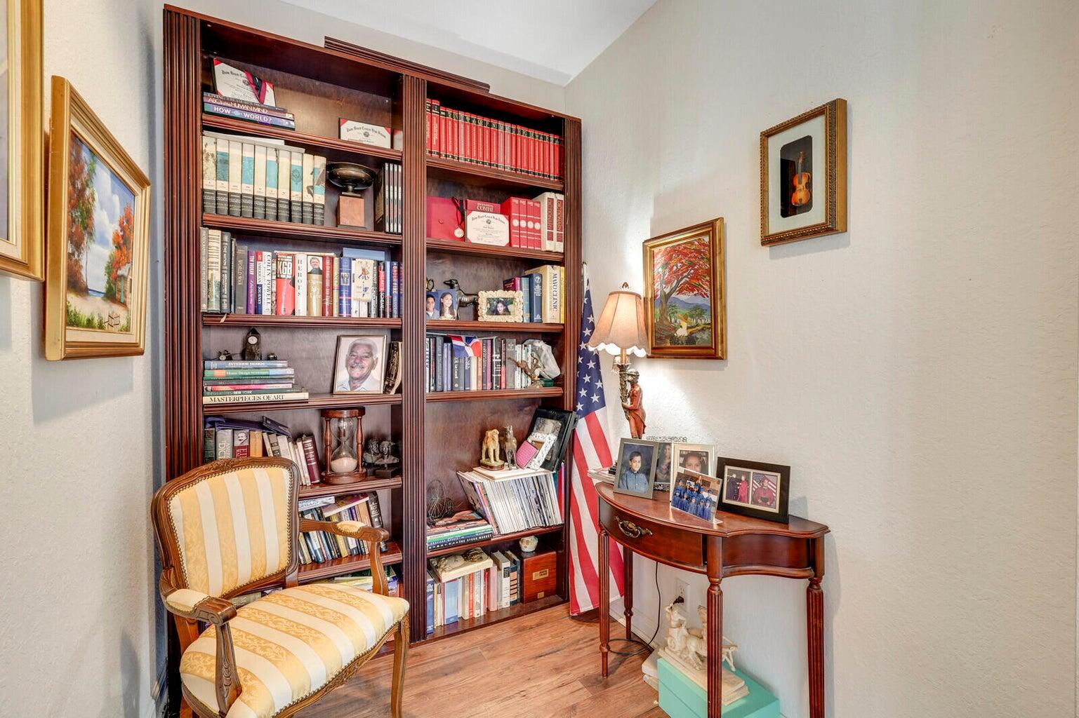 599 Cresta Circle West Palm Beach, FL 33413 - Photo 26 of 56 a reading room with furniture and book shelf
