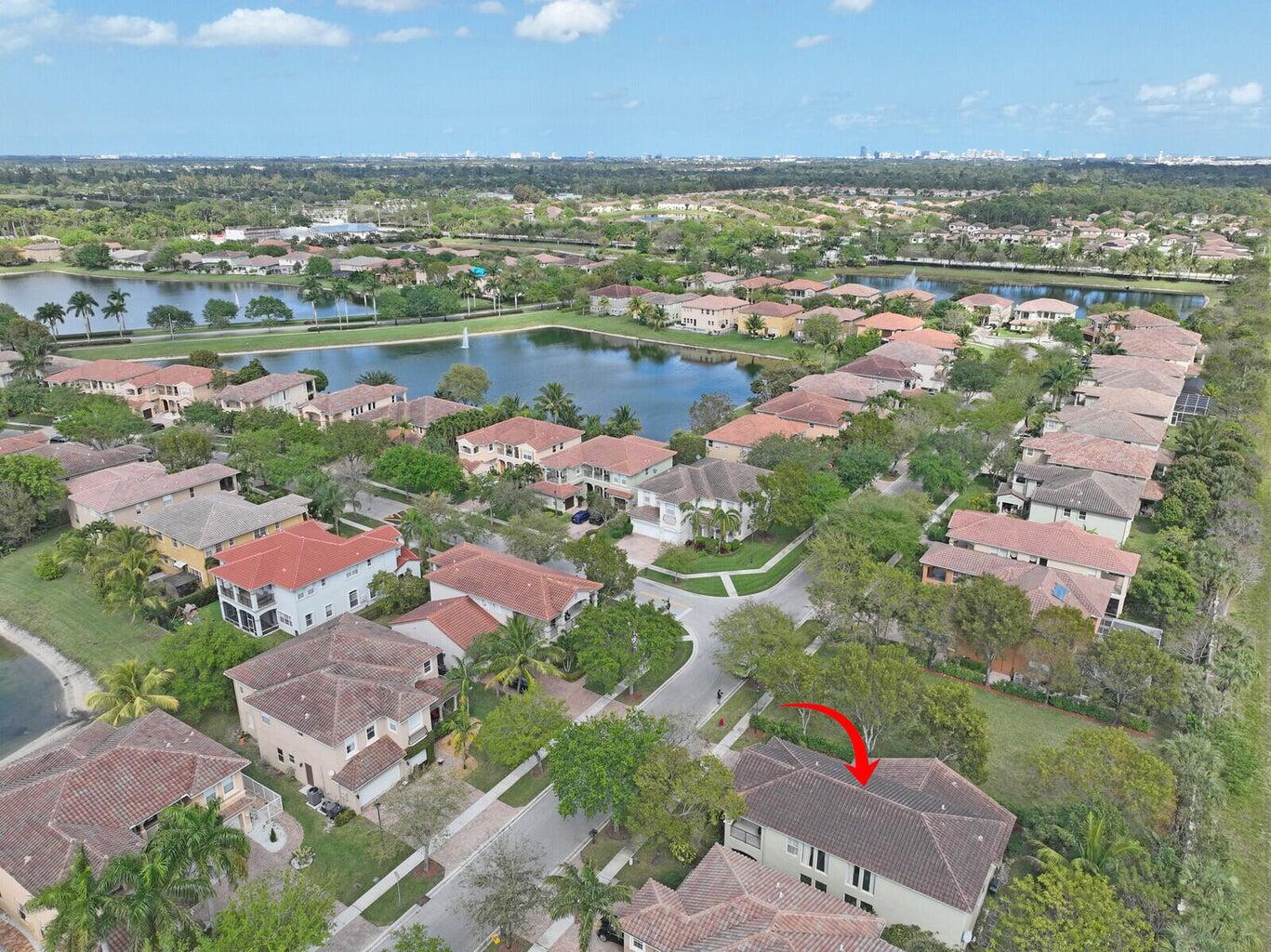 599 Cresta Circle West Palm Beach, FL 33413 - Photo 3 of 56 an aerial view of residential houses with outdoor space and river