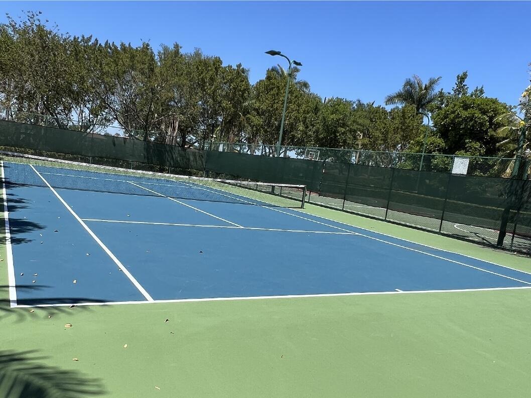 599 Cresta Circle West Palm Beach, FL 33413 - Photo 52 of 56 a view of a tennis court