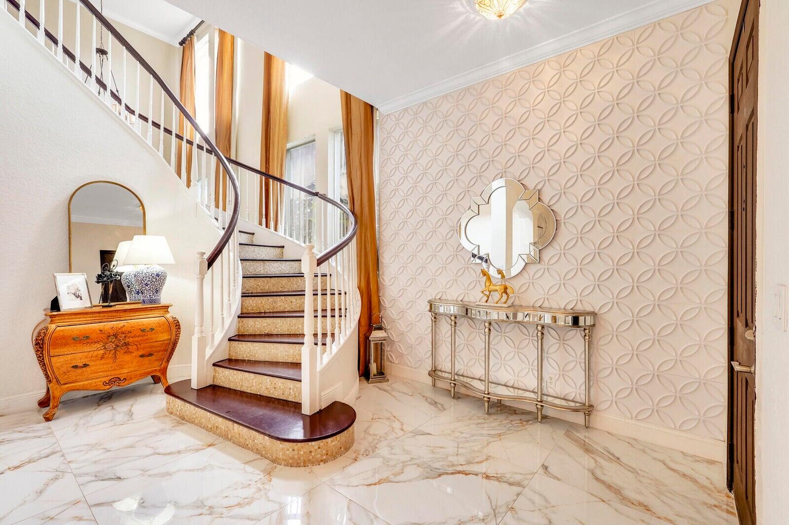 599 Cresta Circle West Palm Beach, FL 33413 - Photo 9 of 56 a view of entryway and hall with wooden floor