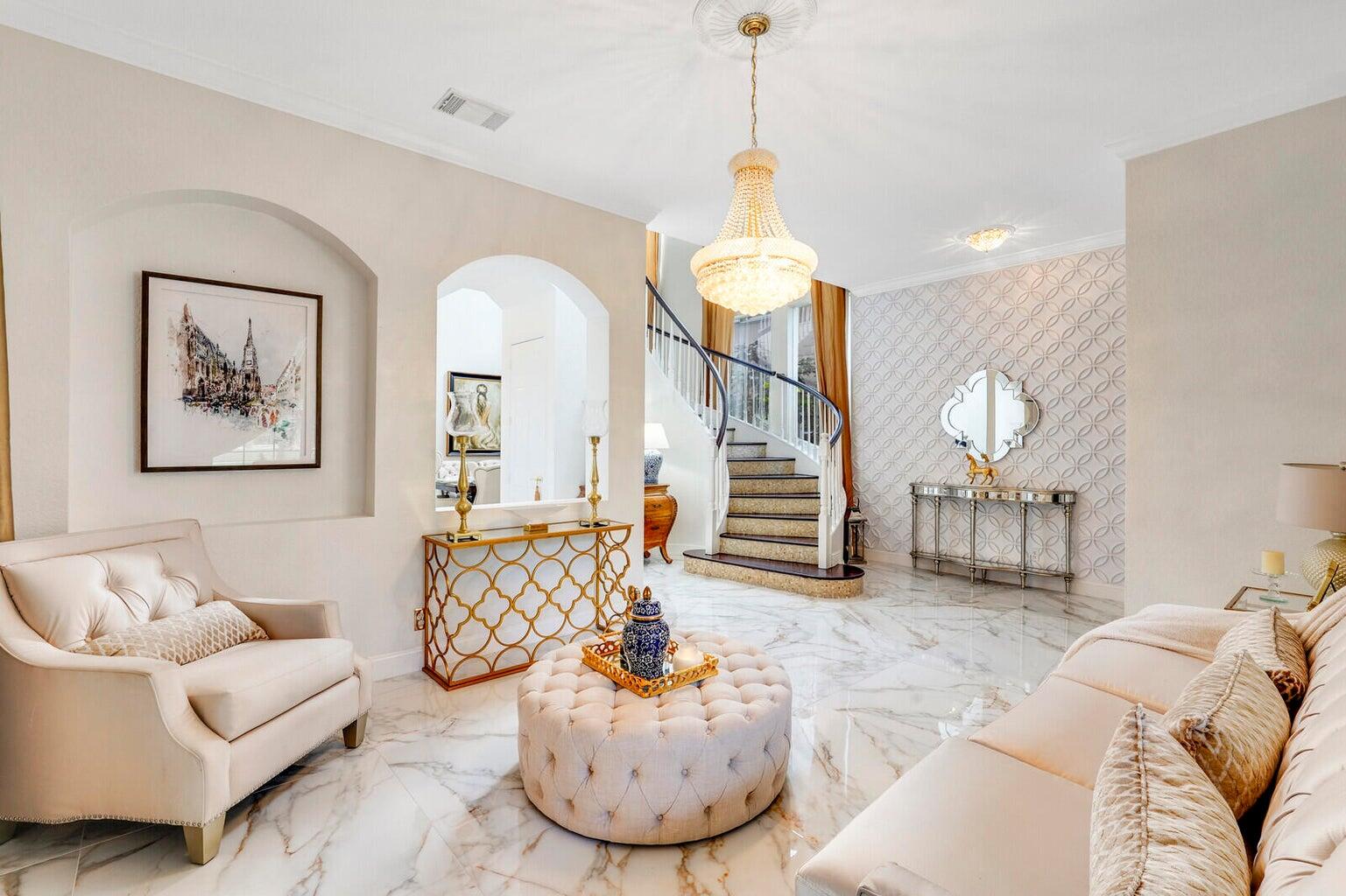 599 Cresta Circle West Palm Beach, FL 33413 - Photo 10 of 56 a living room with furniture and a chandelier