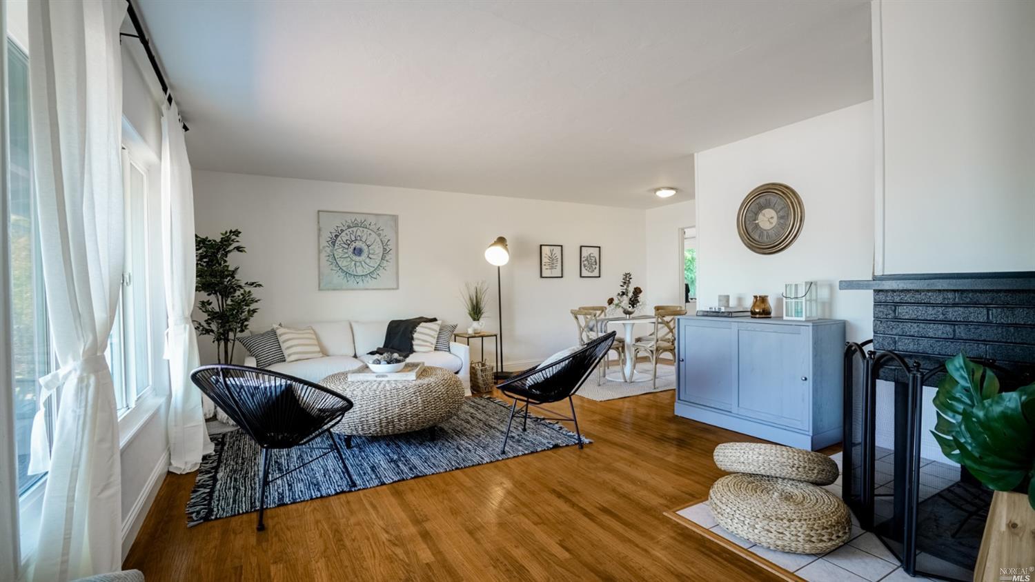 123 Hawthorne Way San Rafael, CA 94903 - Photo 1 of 1 a living room with furniture and wooden floor