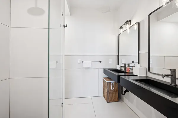 a kitchen with a sink and a refrigerator