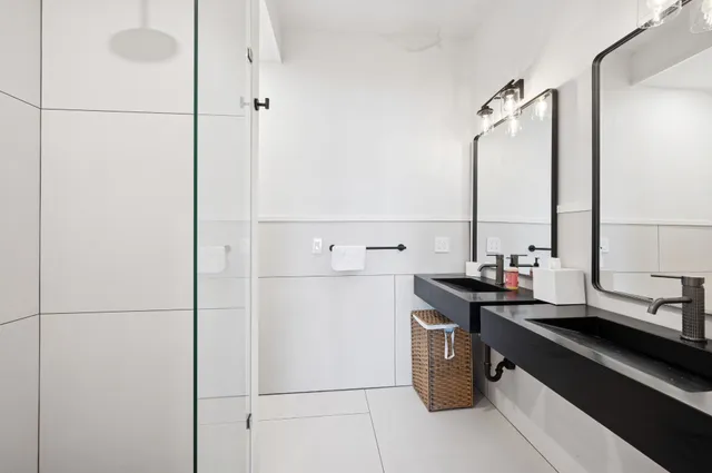 a kitchen with a sink and a refrigerator