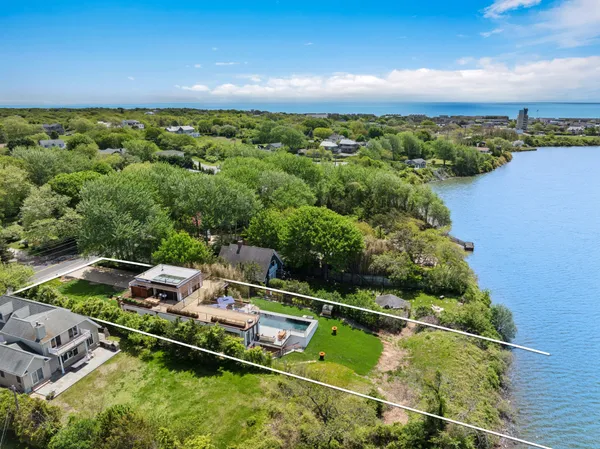 an aerial view of a house with a garden