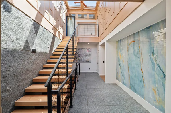 a view of entryway with wooden floor