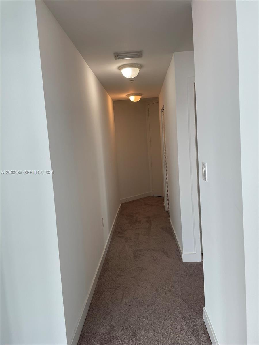 79 Southwest 12th Street, Unit 1601S Miami, FL 33130 - Photo 12 of 18 a view of a hallway