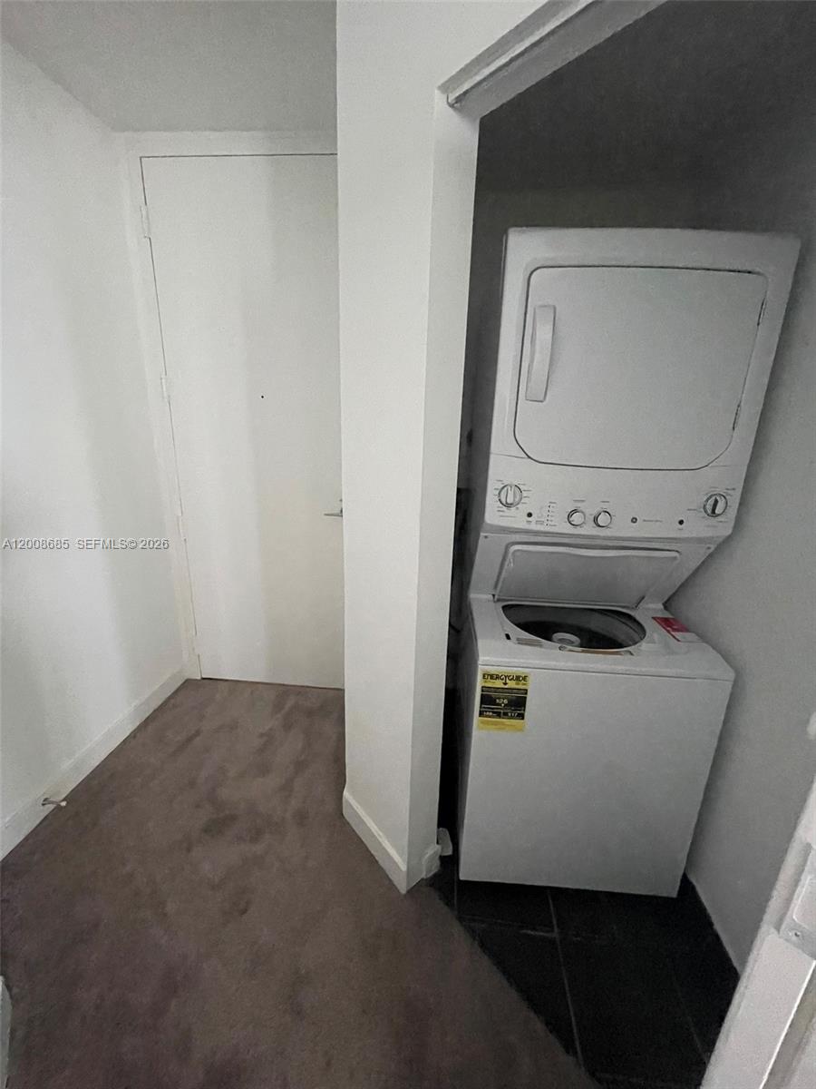 79 Southwest 12th Street, Unit 1601S Miami, FL 33130 - Photo 8 of 18 a utility room with dryer and washer