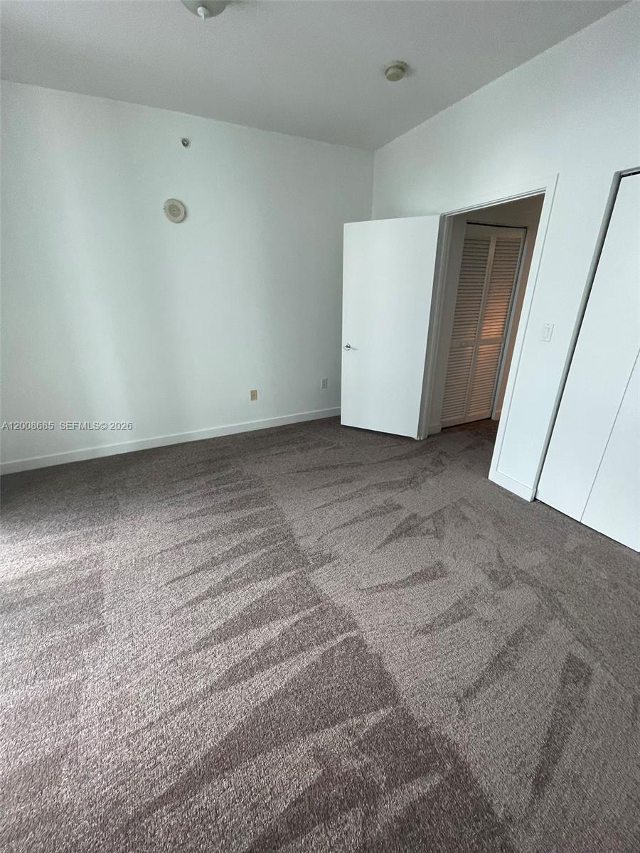 79 Southwest 12th Street, Unit 1601S Miami, FL 33130 - Photo 9 of 18 a view of room with an empty space