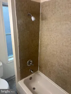 a bathroom with a sink and a tub