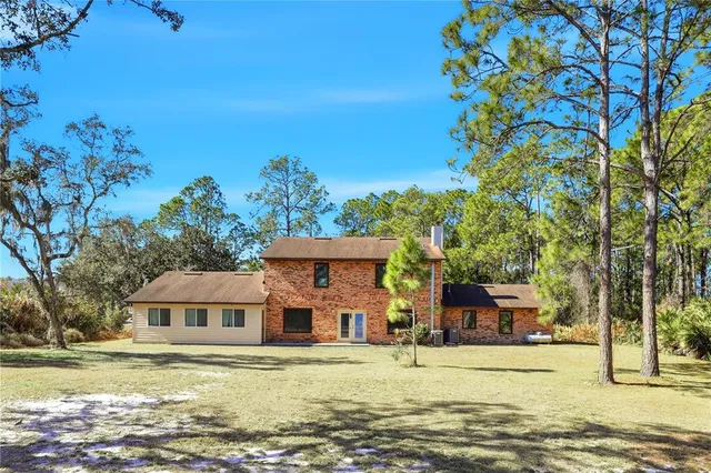 a kitchen with a stove a sink and a refrigerator