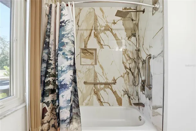 a view of a livingroom with furniture and wooden floor