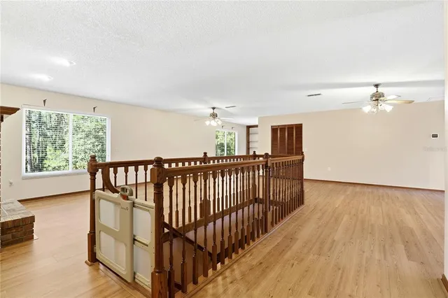 a view of a livingroom with furniture and an entryway