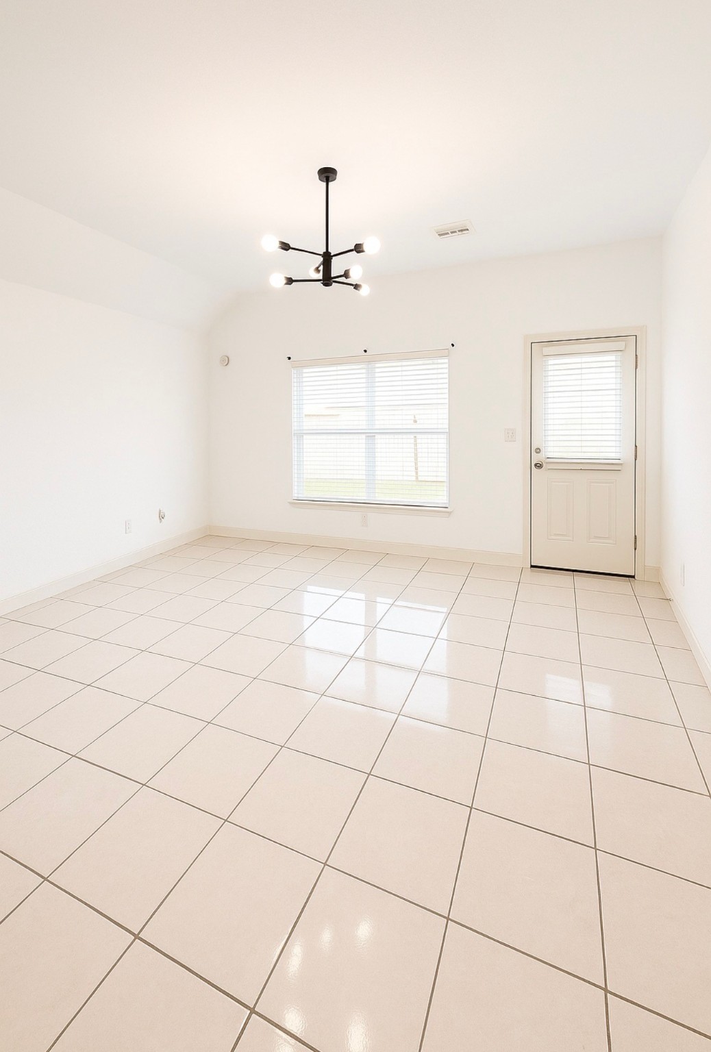 4915 Manor Stone Lane Rosenberg, TX 77469 - Photo 2 of 10 wooden floor in an empty room and a window