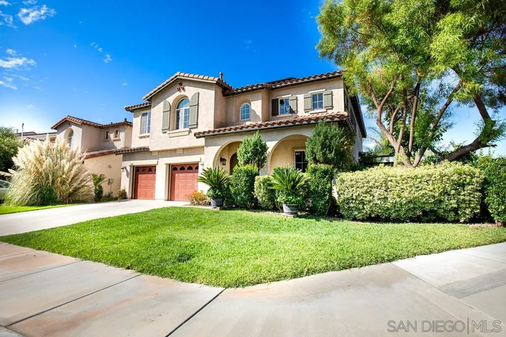 31340 Locust Court Temecula, CA 92592 - Photo 1 of 24 a front view of a house with a yard