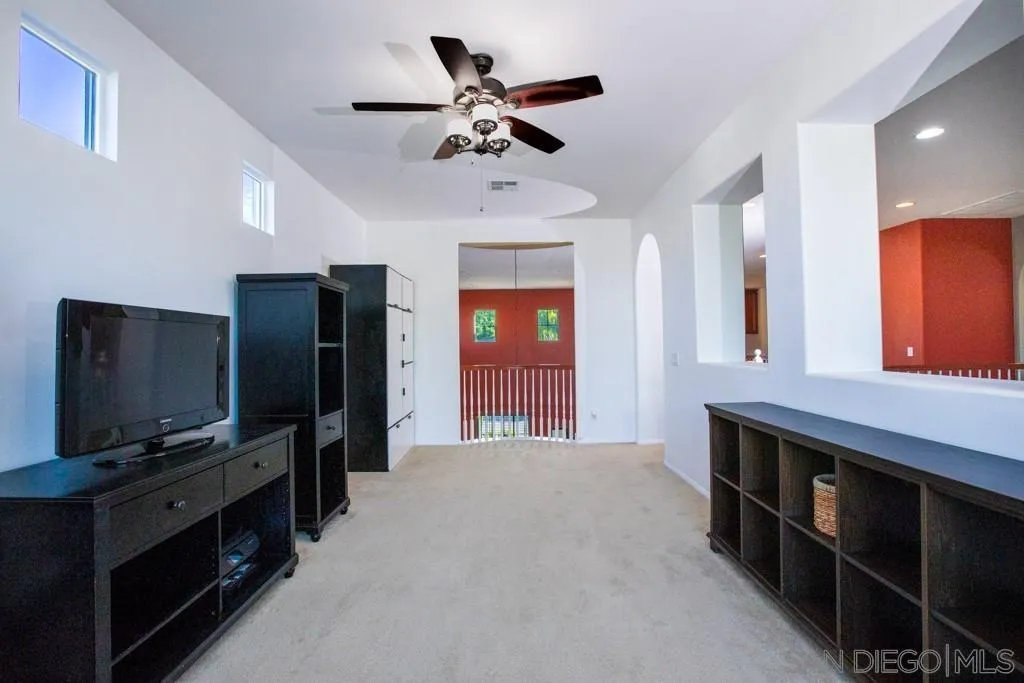 31340 Locust Court Temecula, CA 92592 - Photo 12 of 24 a living room with furniture and a flat screen tv