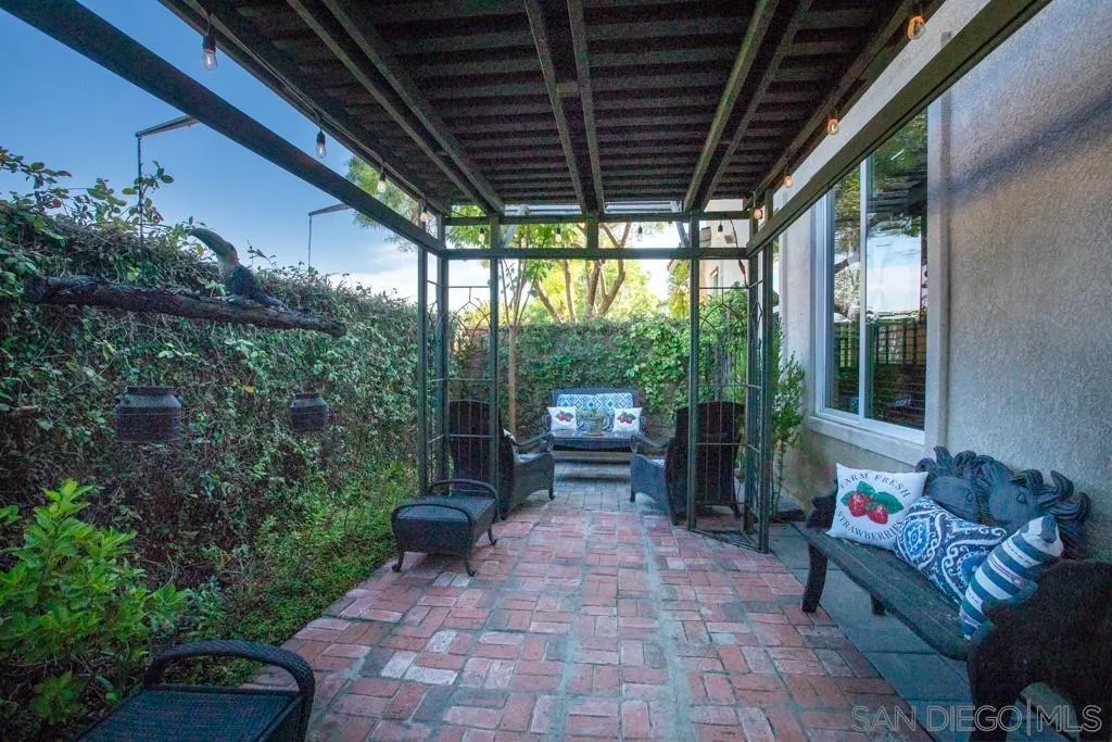 31340 Locust Court Temecula, CA 92592 - Photo 24 of 24 a view of a porch with furniture and a yard