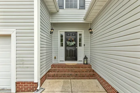 a view of a entryway with a door