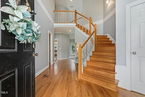 a view of entryway with wooden floor