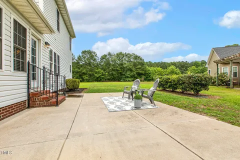 a view of a house with a patio