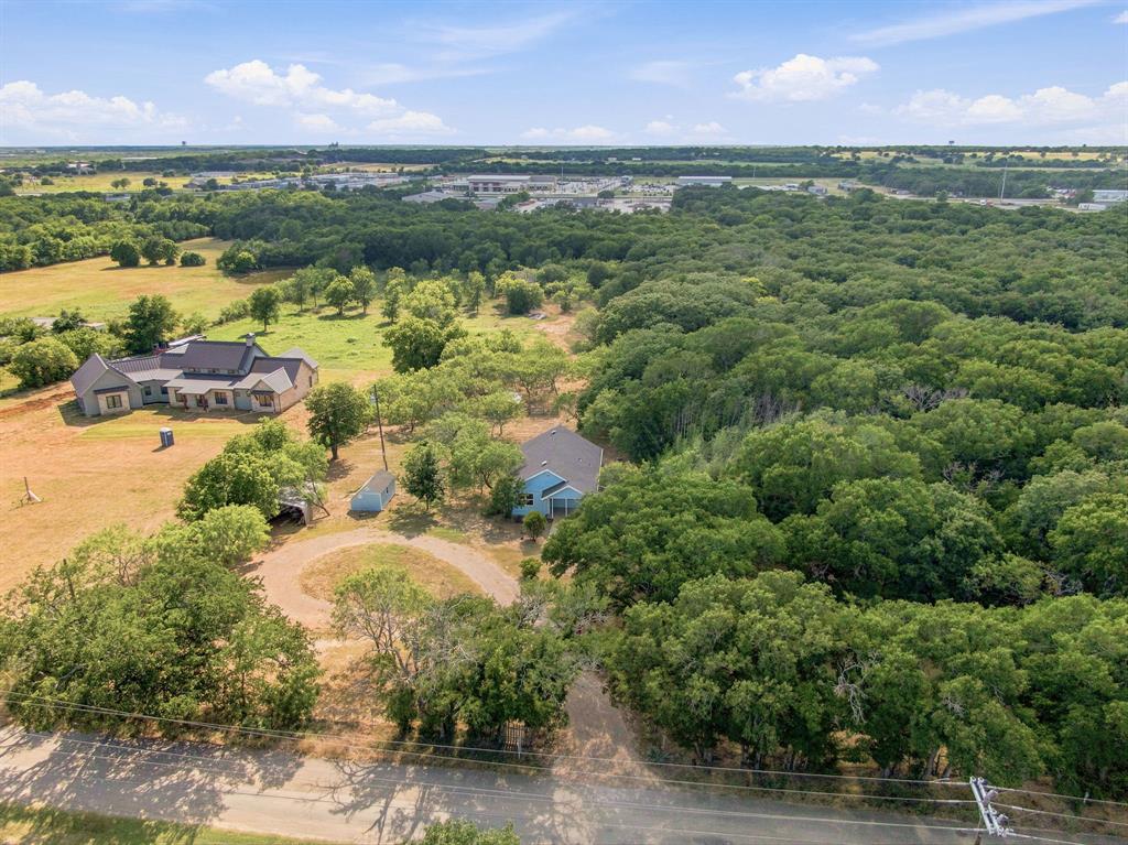 3325 Dove Creek Road Cleburne, TX 76031 - Photo 29 of 40 Expansive wooded lot featuring multiple mature trees and natural landscaping