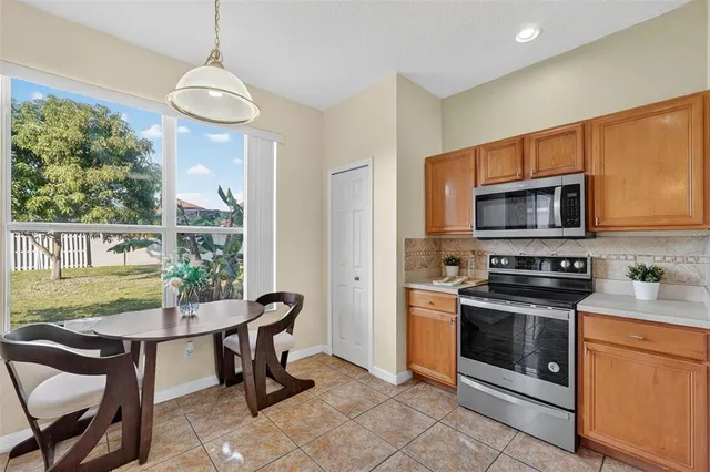 a bed room with a bed and a chandelier