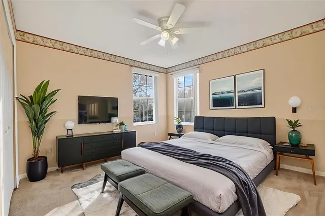 an aerial view of a house with garden space and street view