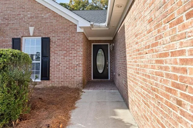 a front view of a house with a shower