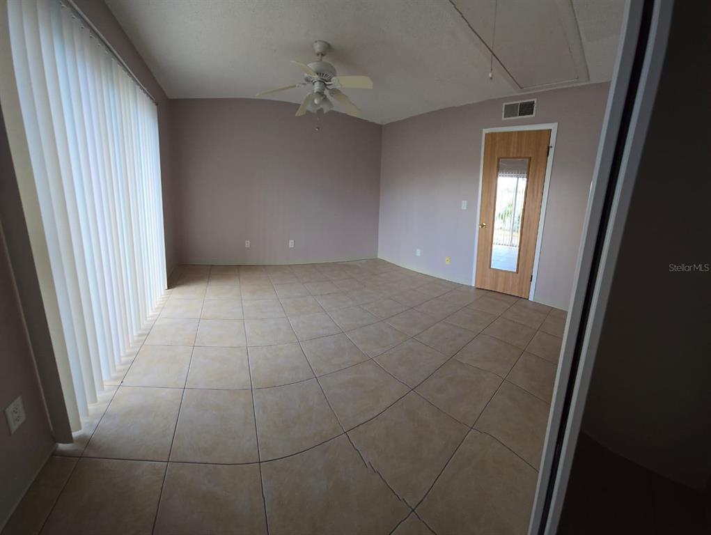 24862 US Highway 19 North, Unit 703 Clearwater, FL 33763 - Photo 14 of 24 a view of an empty room and a window