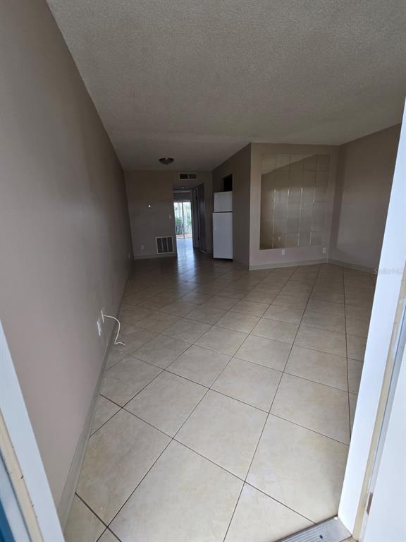24862 US Highway 19 North, Unit 703 Clearwater, FL 33763 - Photo 4 of 24 a view of a livingroom and entryway