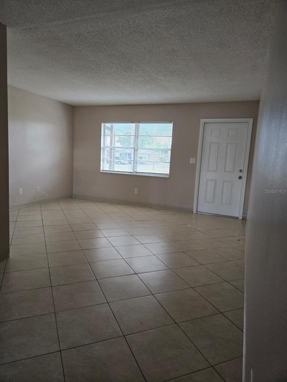 24862 US Highway 19 North, Unit 703 Clearwater, FL 33763 - Photo 5 of 24 a view of an empty room with a window
