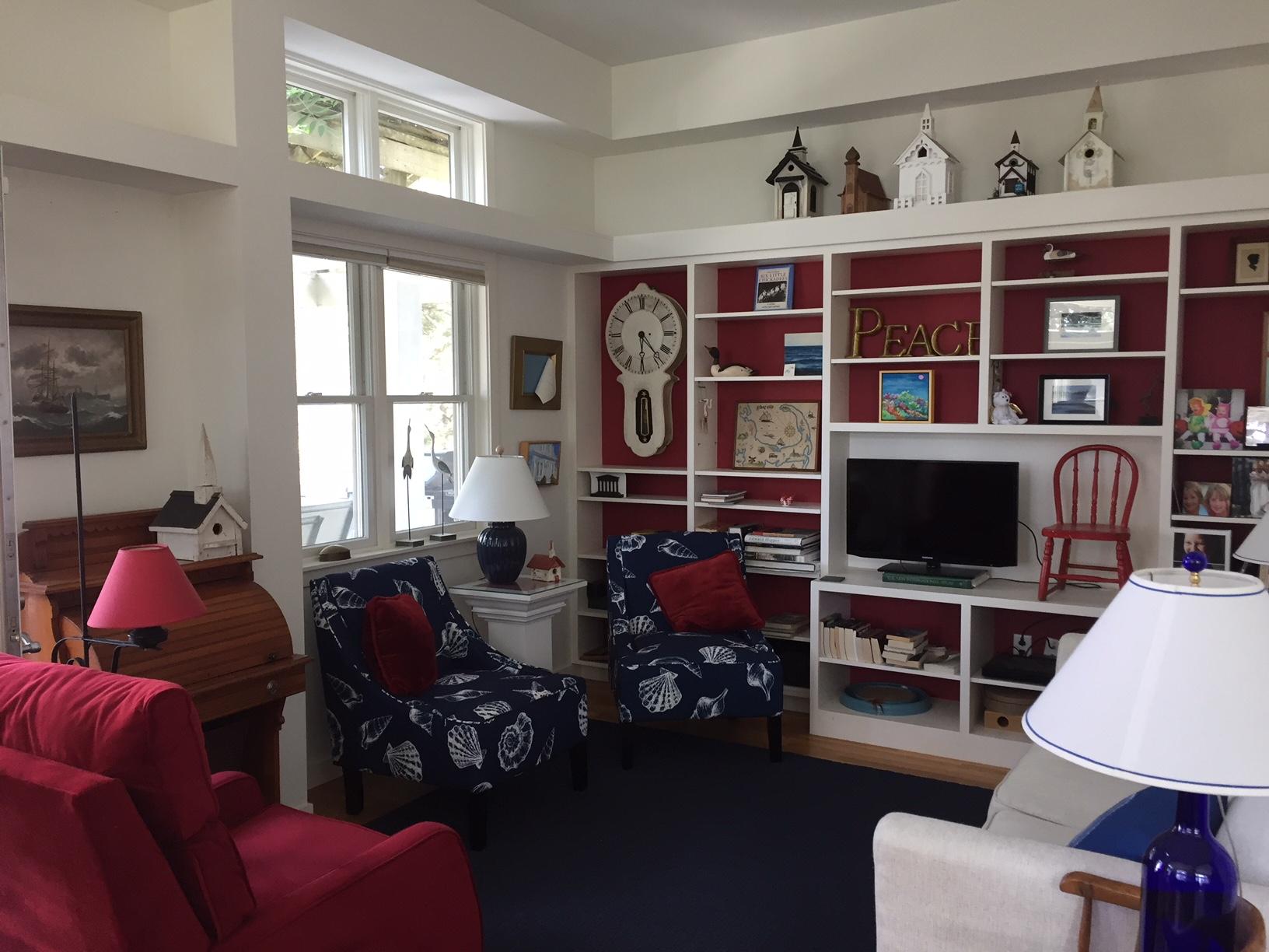 1000 Old County Road Wellfleet, MA 02667 - Photo 21 of 35 a living room with furniture a window and a flat screen tv