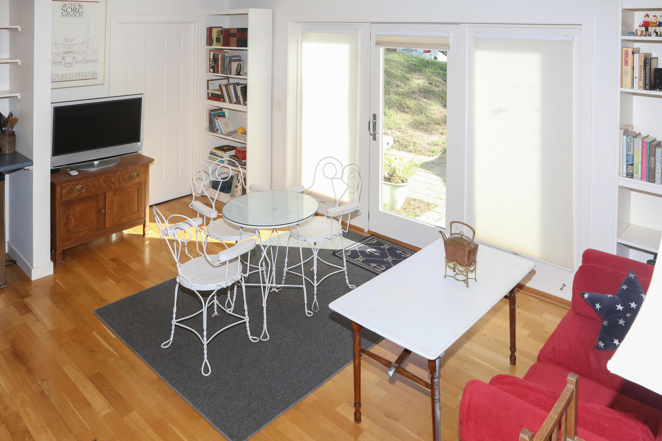 1000 Old County Road Wellfleet, MA 02667 - Photo 27 of 35 a view of a dining room with furniture window and wooden floor