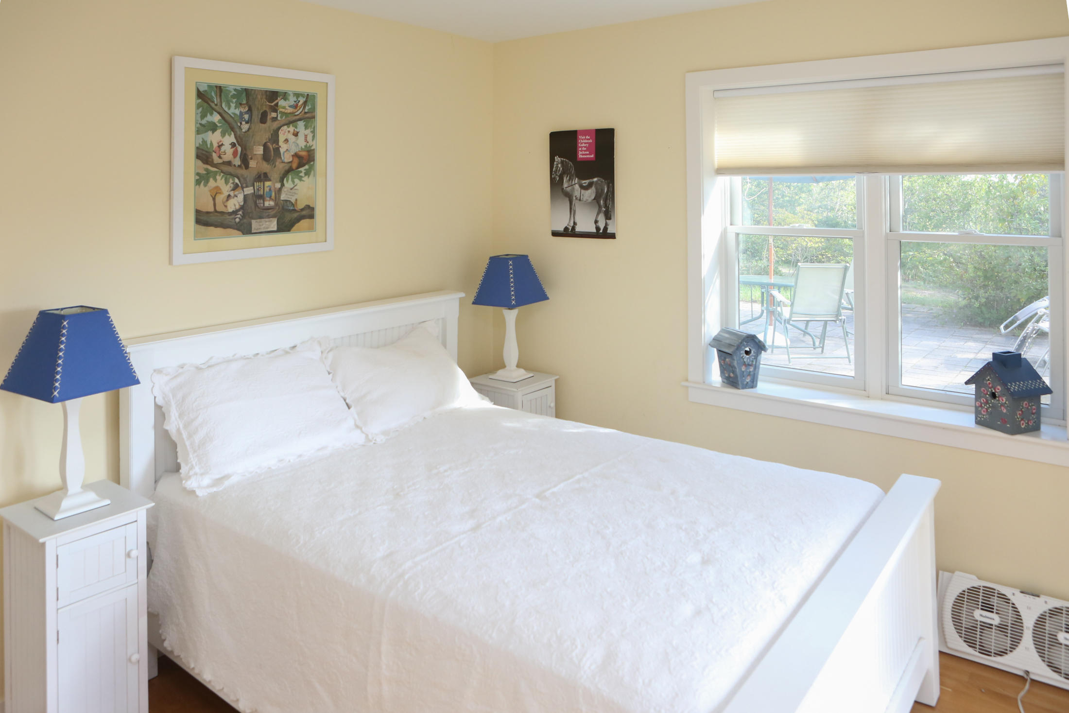 1000 Old County Road Wellfleet, MA 02667 - Photo 32 of 35 a bedroom with a bed and a large window