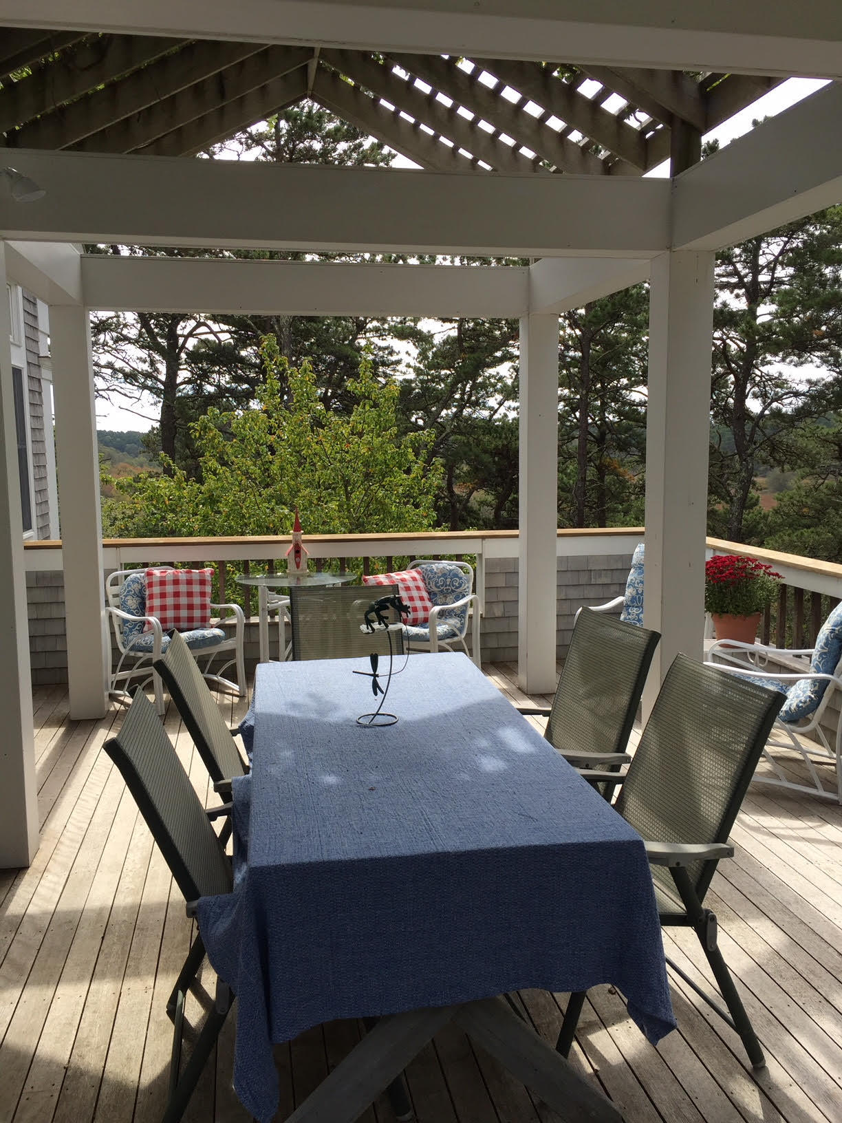 1000 Old County Road Wellfleet, MA 02667 - Photo 4 of 35 a view of a patio with table and chairs
