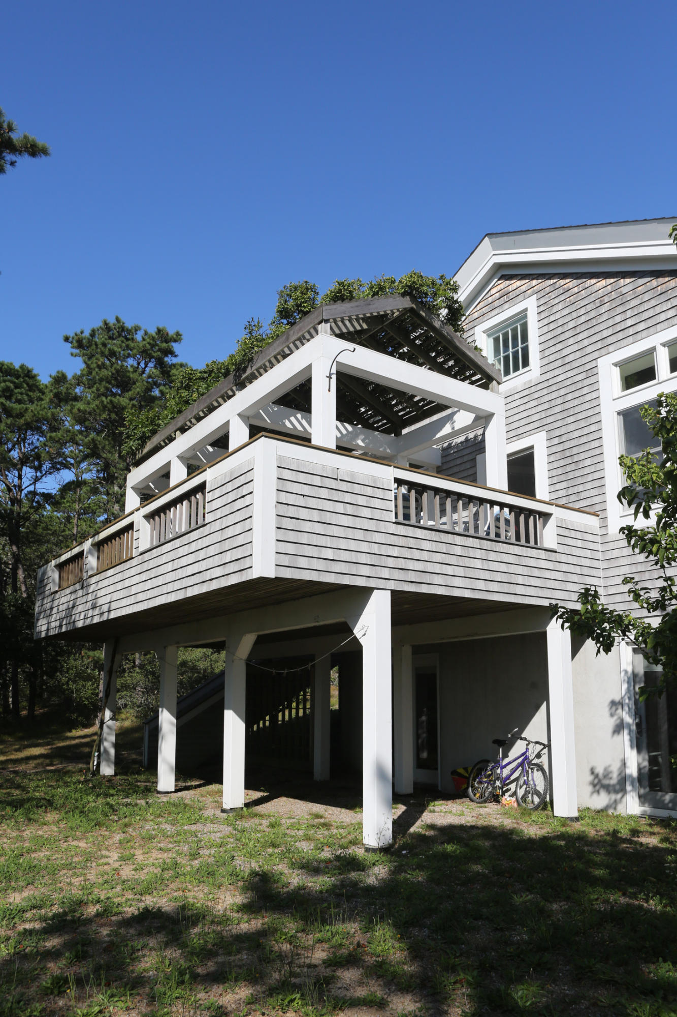 1000 Old County Road Wellfleet, MA 02667 - Photo 5 of 35 a front view of a house with a yard