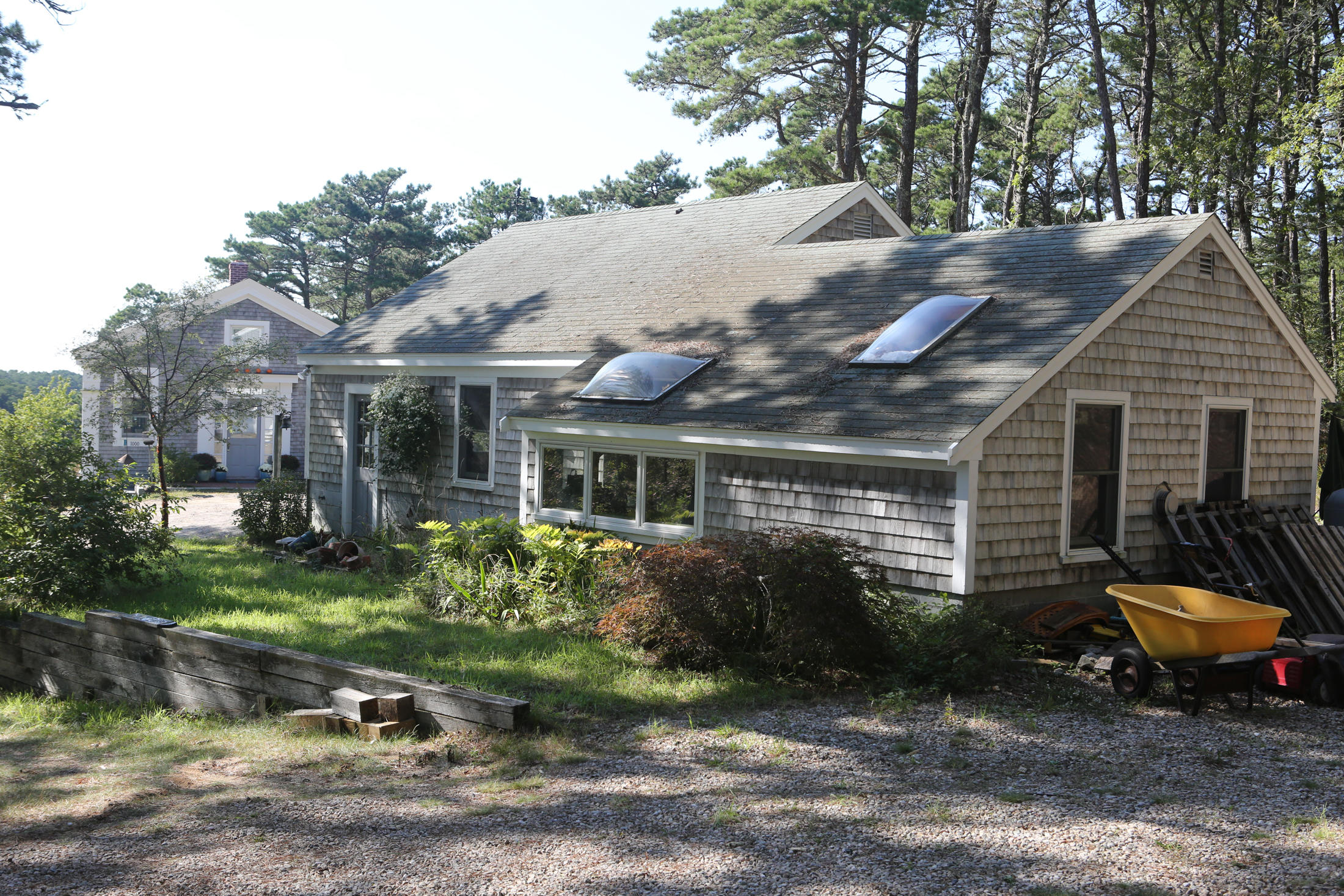 1000 Old County Road Wellfleet, MA 02667 - Photo 9 of 35 a backyard of a house with outdoor seating