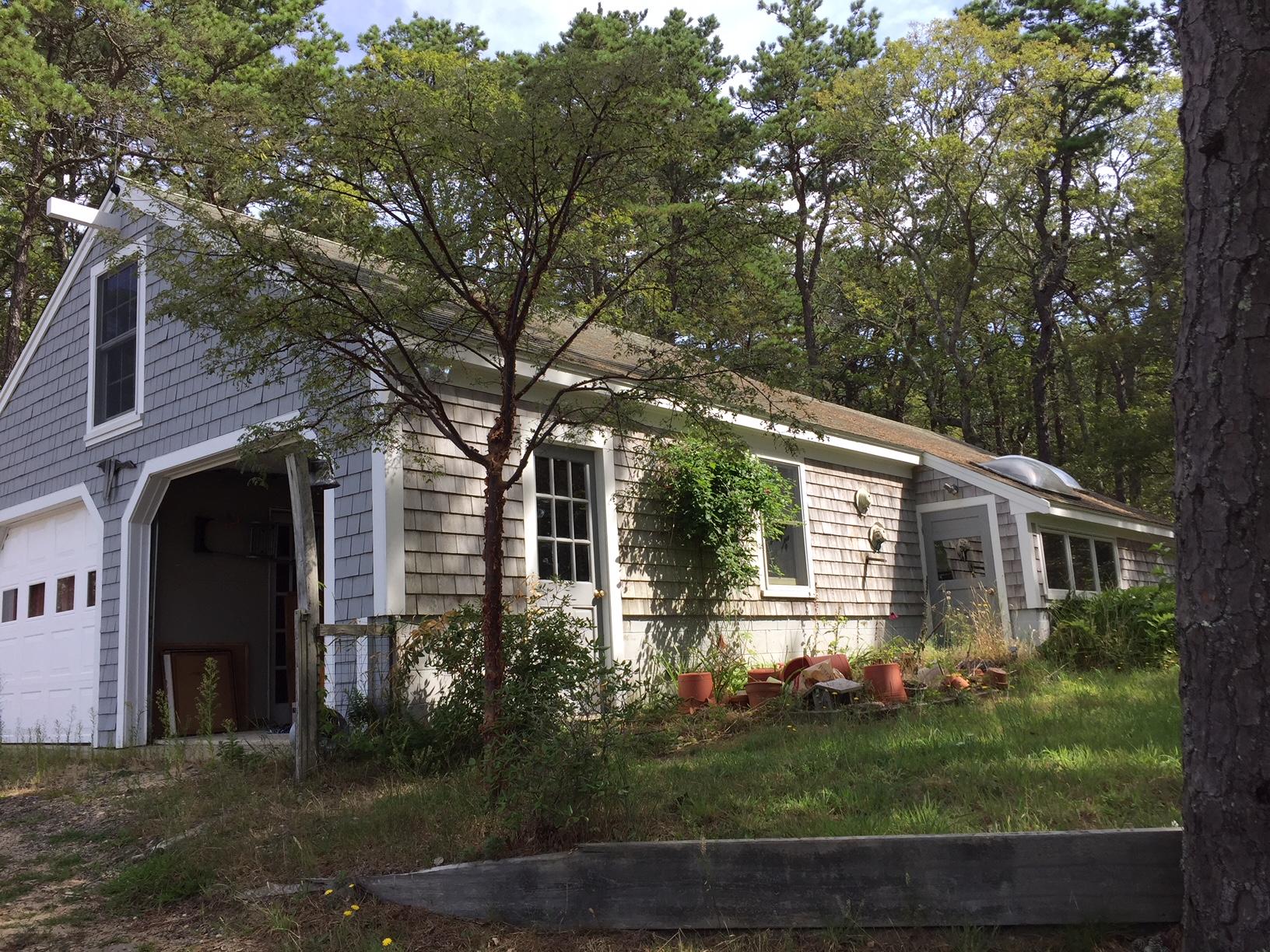 1000 Old County Road Wellfleet, MA 02667 - Photo 10 of 35 front view of a house with a garden