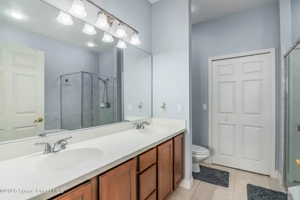 a bathroom with a bath tub and shower