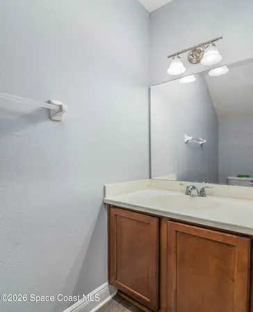 a view of a balcony with chairs